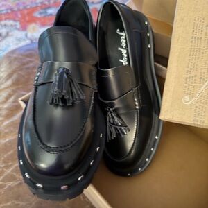 Free People Black Tassel Loafers with silver toned flat rivets/studs